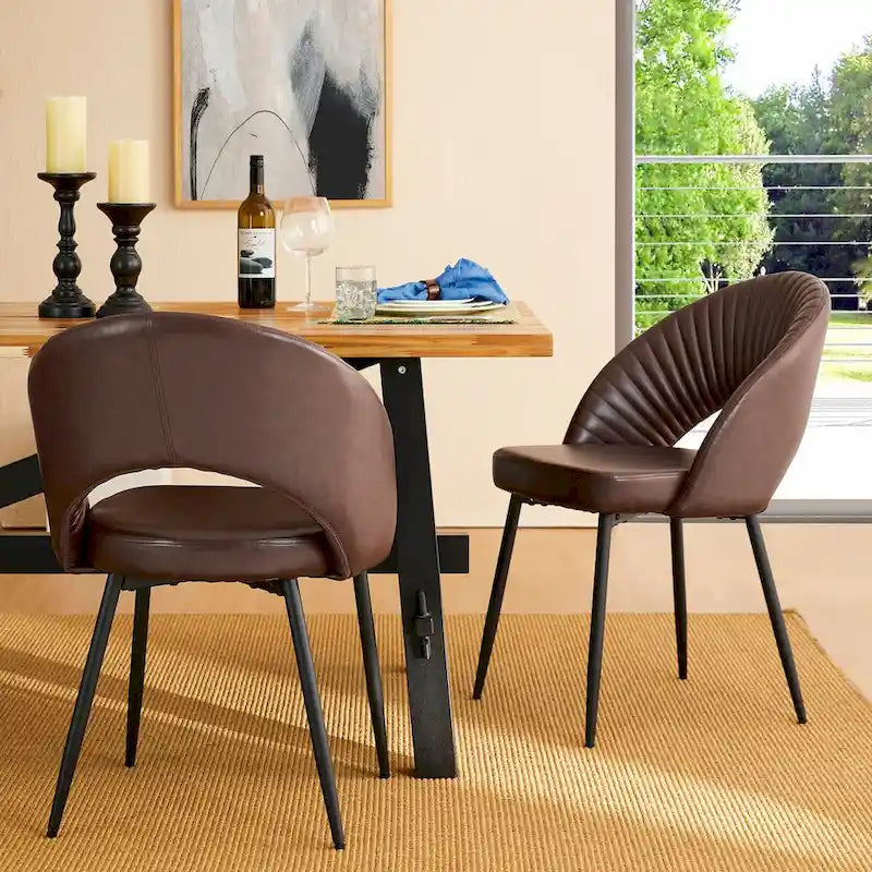 Chaise de salle à manger latérale matelassée en similicuir style Mid-Century Modern avec pieds fuselés en métal