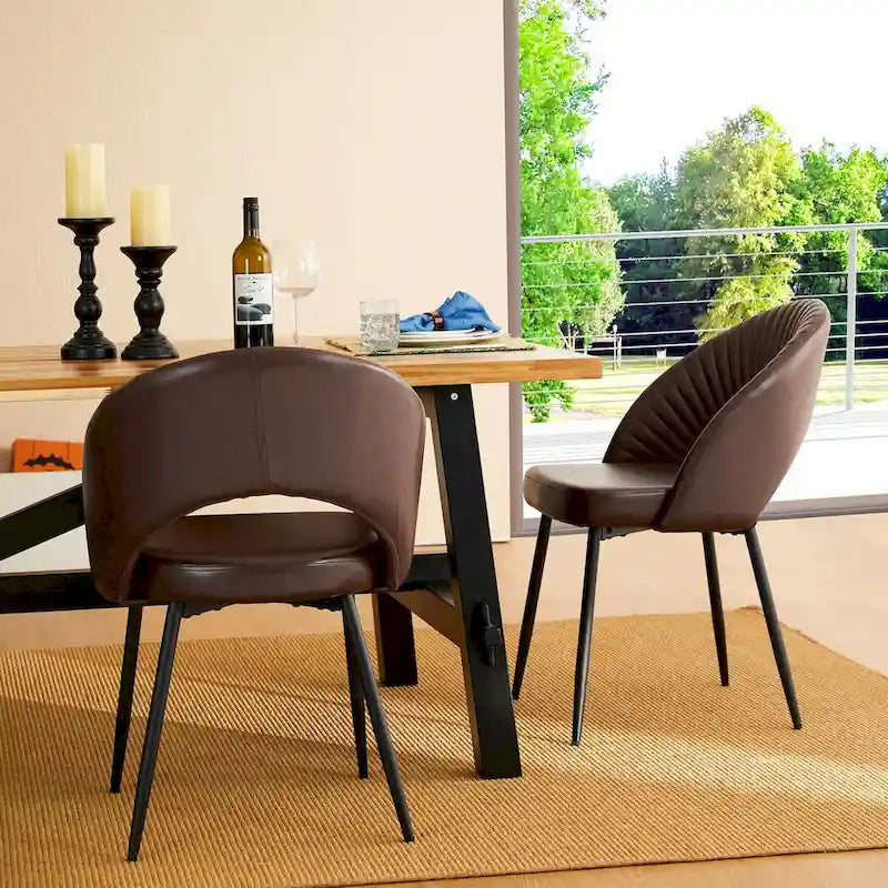 Chaise de salle à manger latérale matelassée en similicuir style Mid-Century Modern avec pieds fuselés en métal