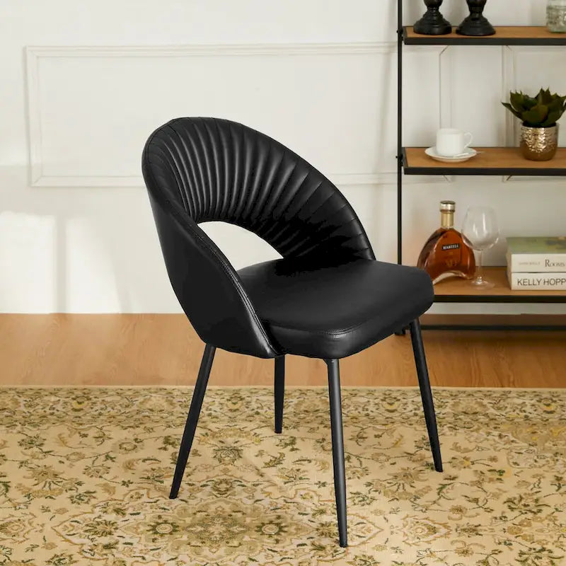 Chaise de salle à manger latérale matelassée en similicuir style Mid-Century Modern avec pieds fuselés en métal
