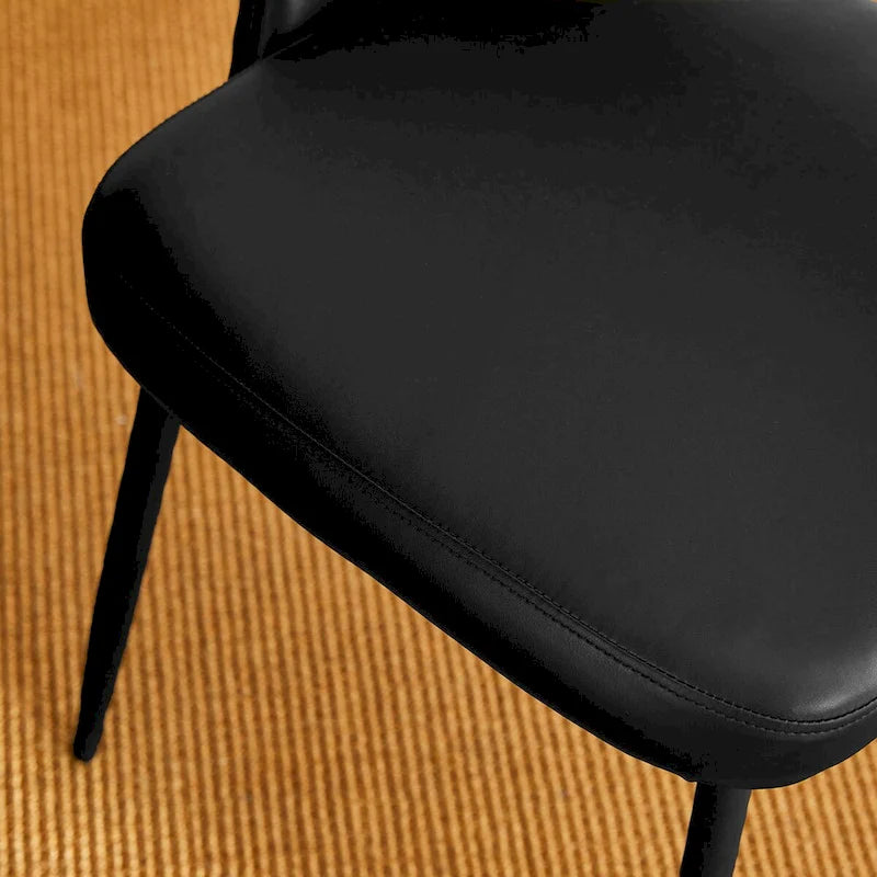 Chaise de salle à manger latérale matelassée en similicuir style Mid-Century Modern avec pieds fuselés en métal