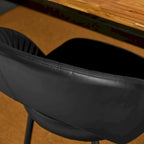 Chaise de salle à manger latérale matelassée en similicuir style Mid-Century Modern avec pieds fuselés en métal